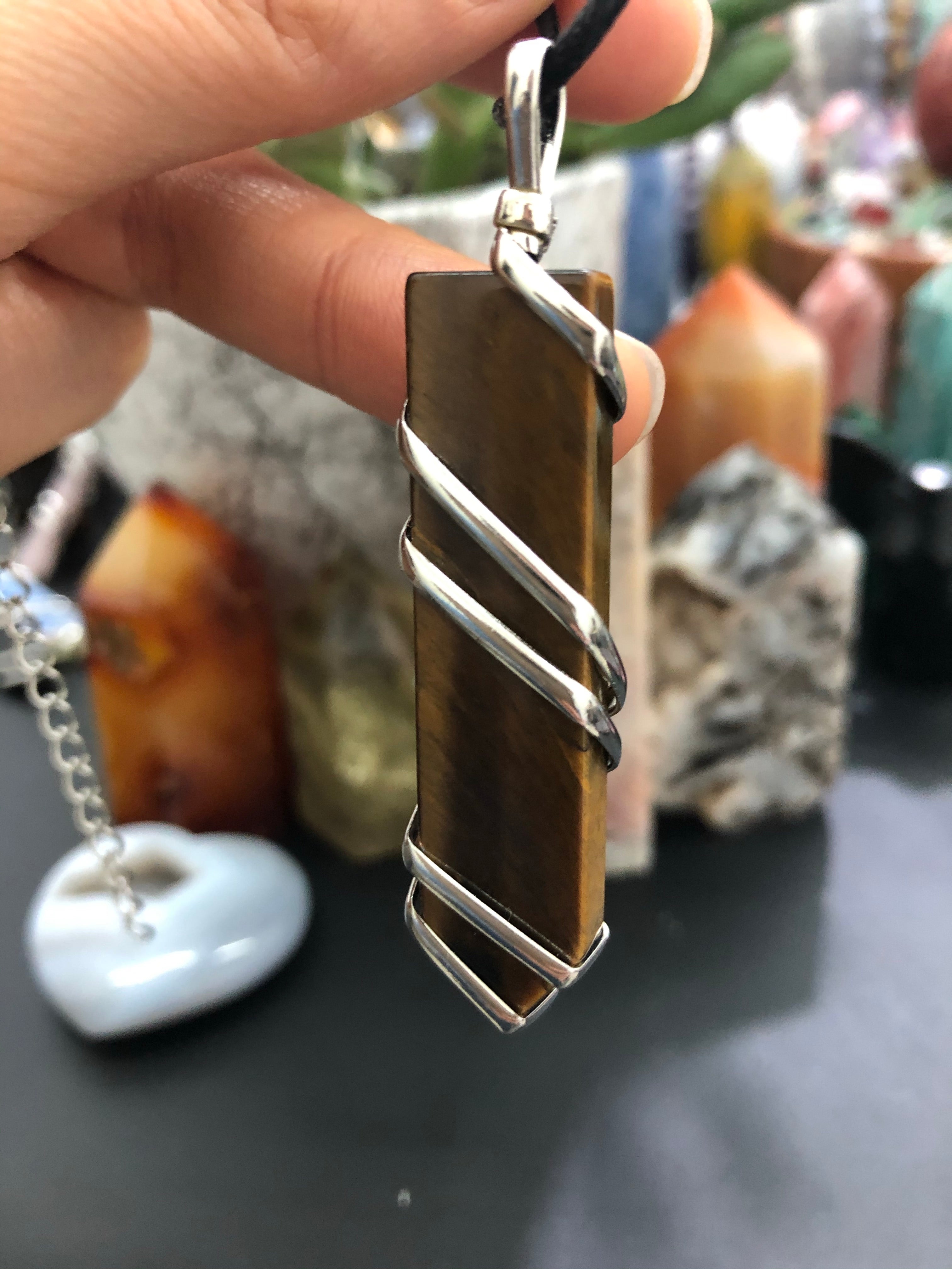 Wired sword pendant